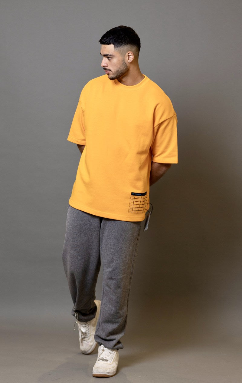 THE TAKING OFF T-SHIRT